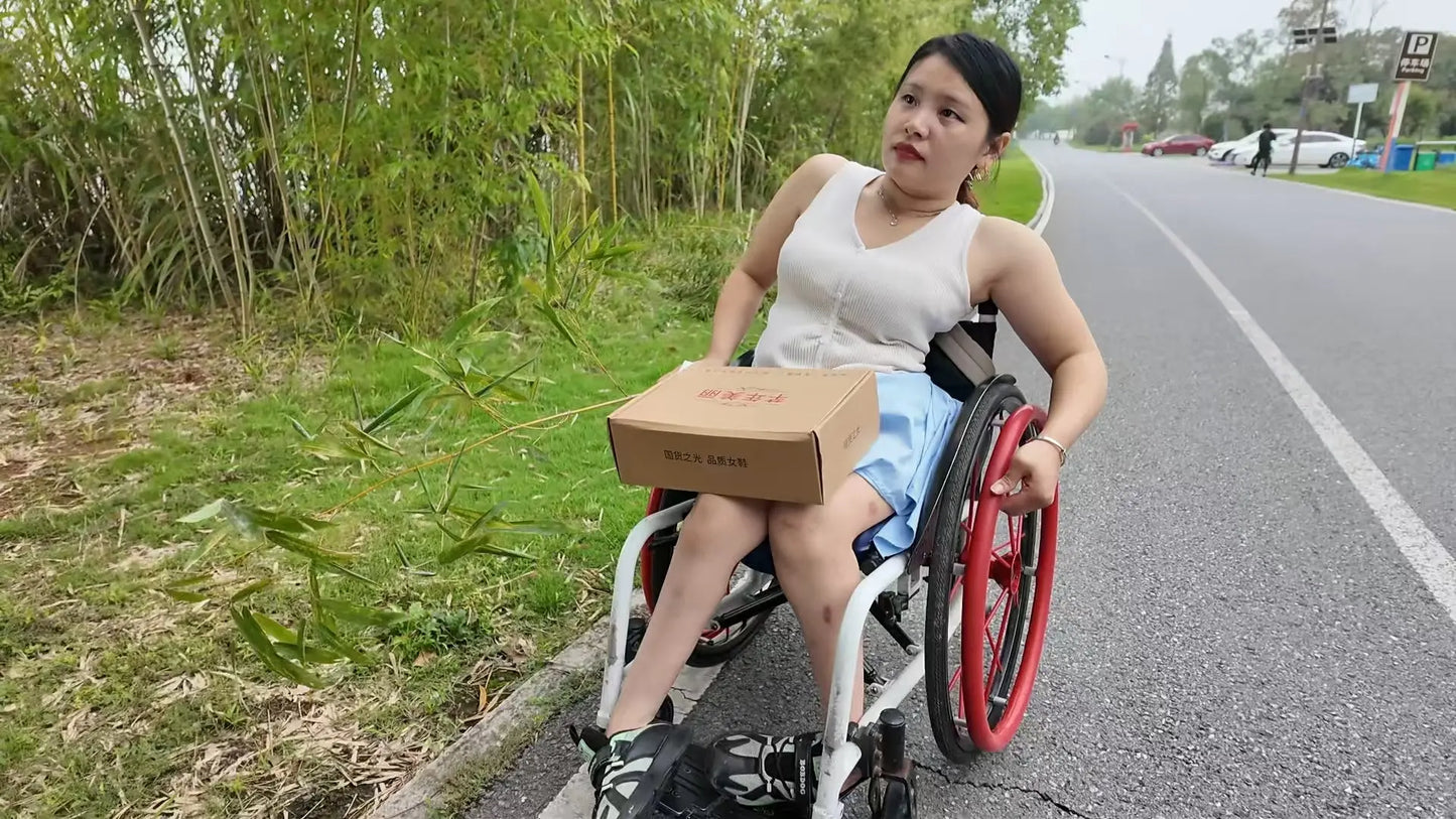 Shera: Paraplegic Girl changing into high heels on a park bench AmputeeClub