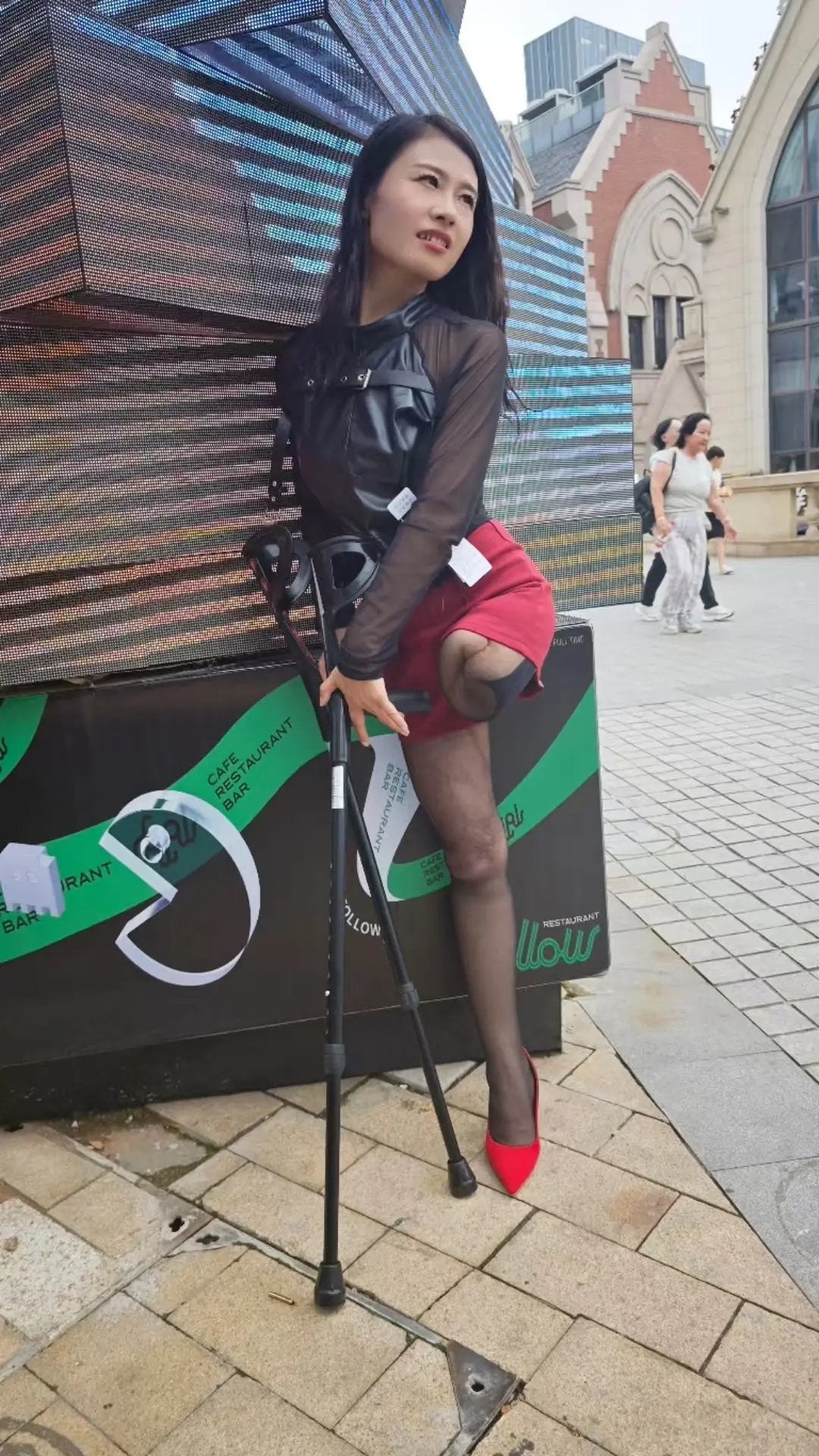 Ayla: Sak Amputee Girl Black stockings and colorful prosthetic limbs for traveling
