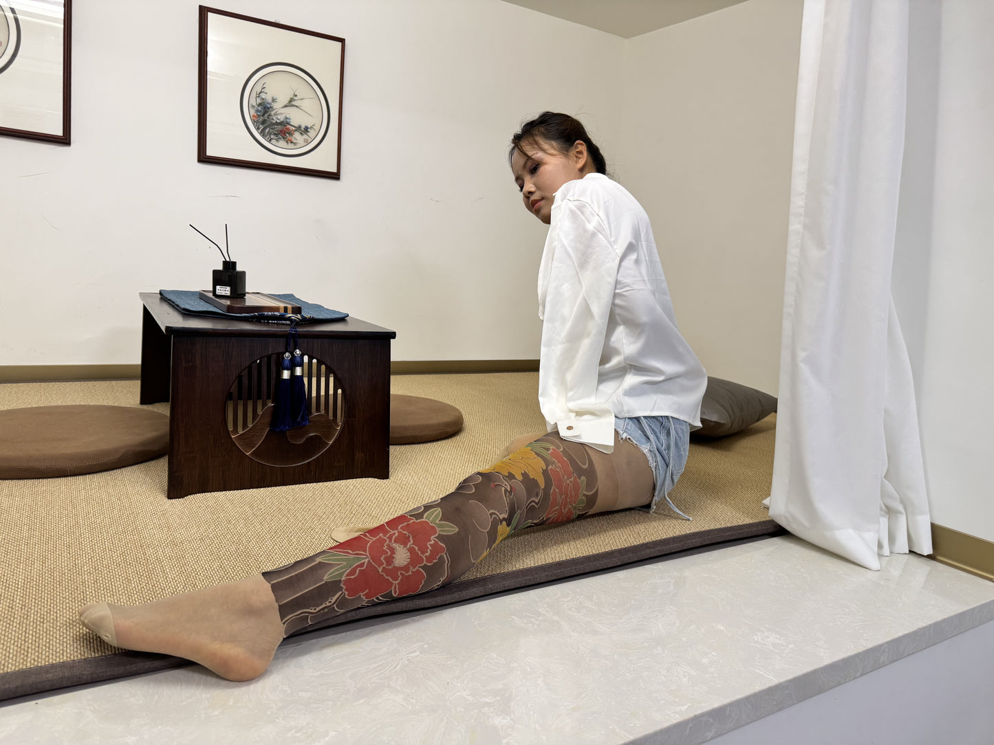 Abby: Ooe Amputee Girl showcasing youthful energy white shirt and denim shorts.