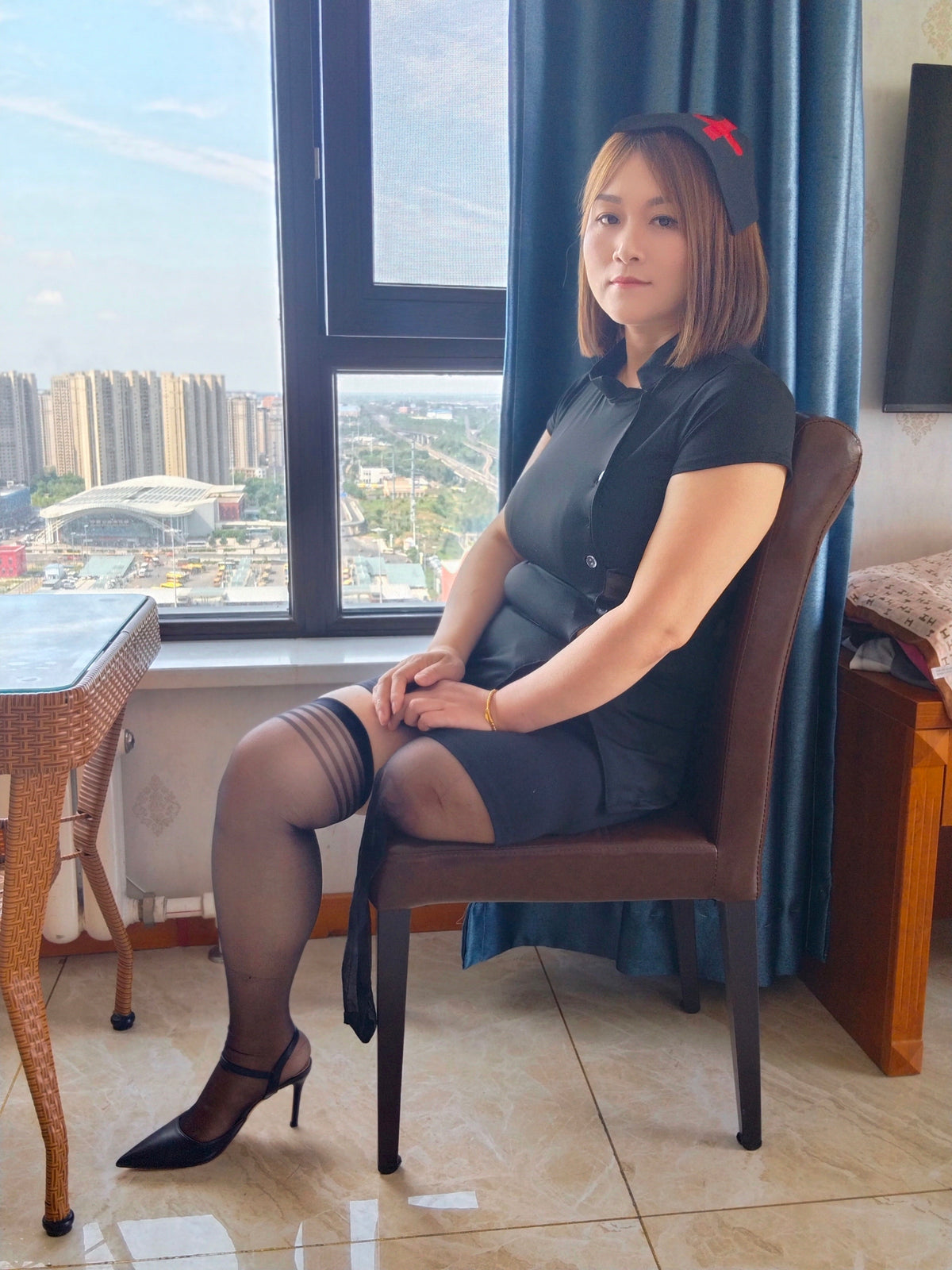 Grace, A Sak Girl – Cosplay: Nurse outfit, crutches, and black stockings.
