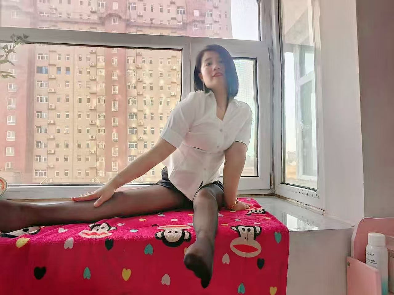 Carrie: The Polio Lady's sexy black stockings paired with a white shirt.