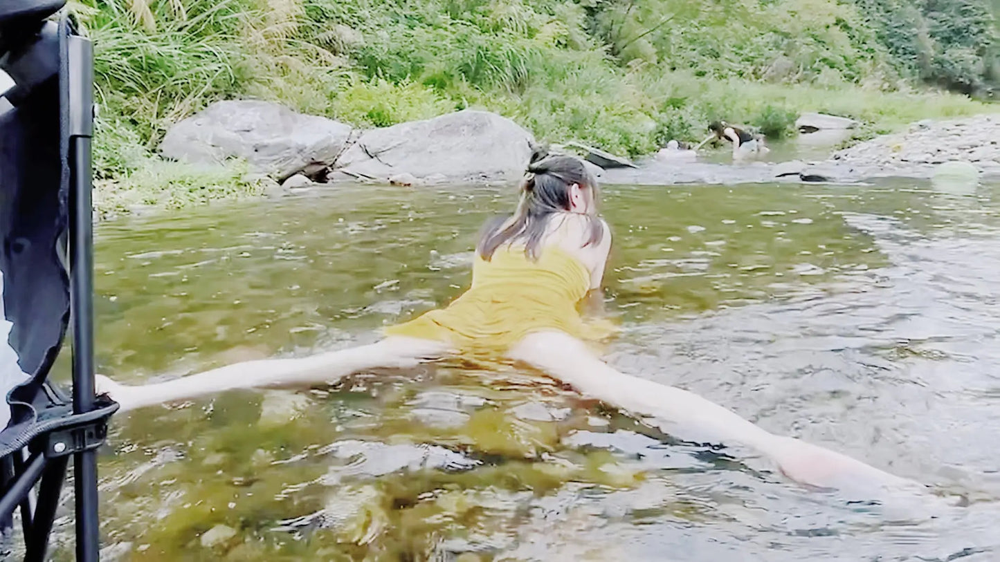 Miki:Polio girl playing by the stream AmputeeClub