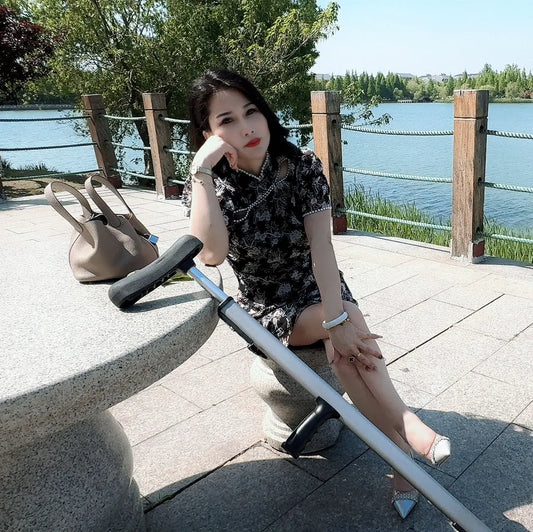 Nancy:Polio Lady wearing a short skirt AmputeeClub