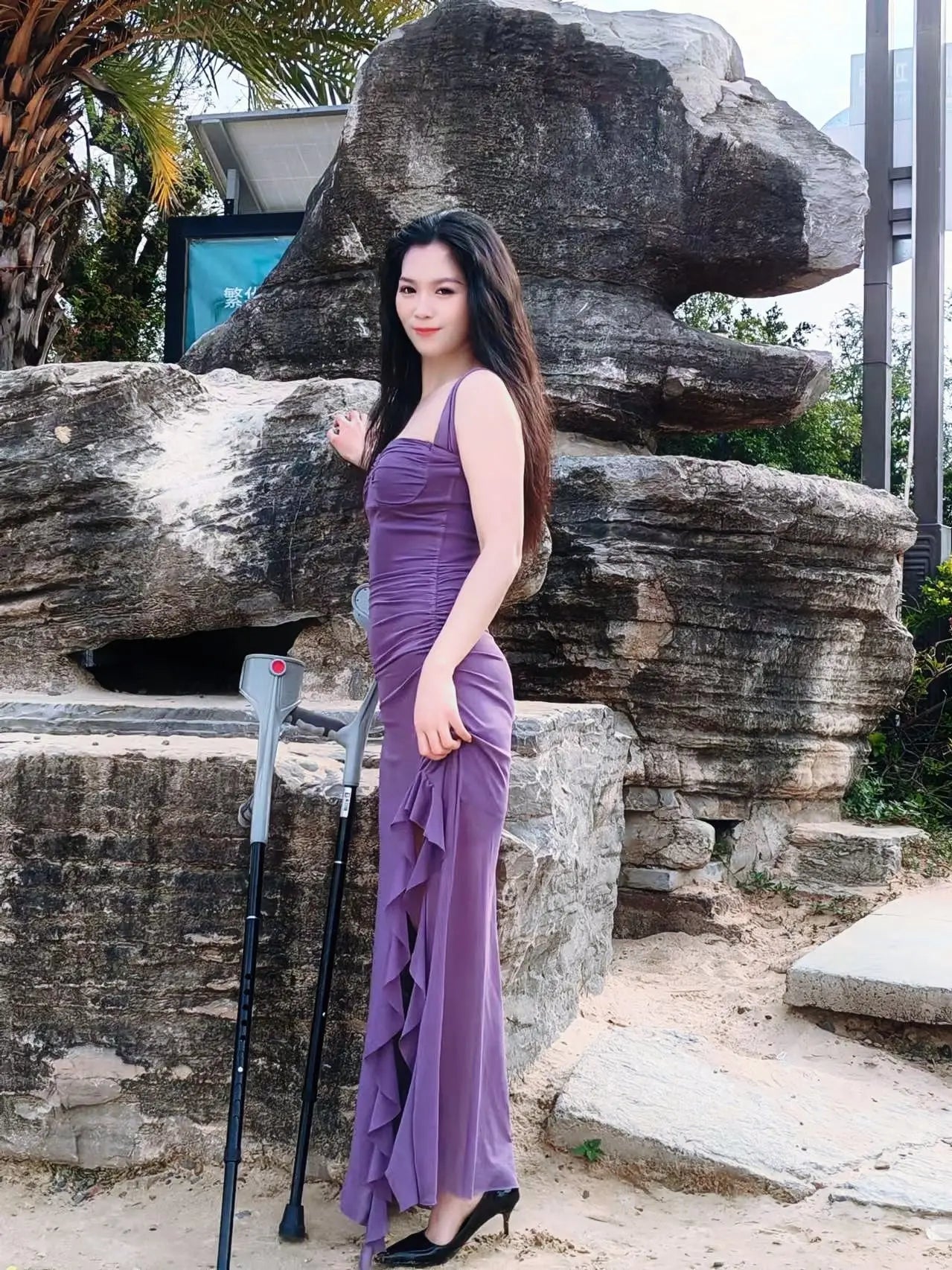 Alisa: Sak Amputee Girl walks by the lake wearing purple clothes AmputeeClub