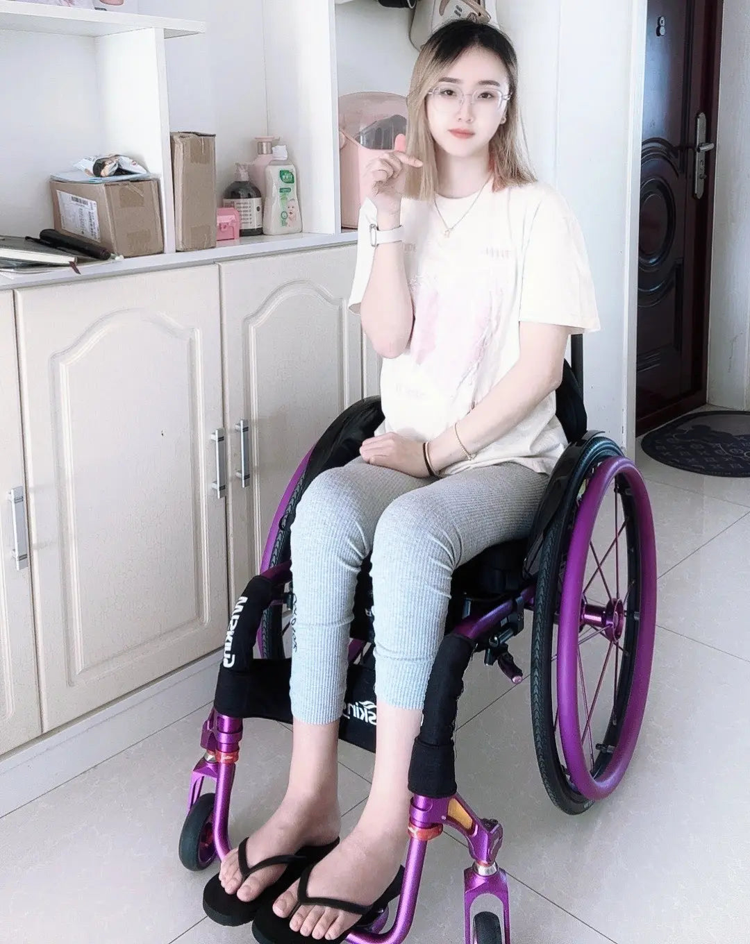 Zoe: Paraplegic Girl's transport device AmputeeClub