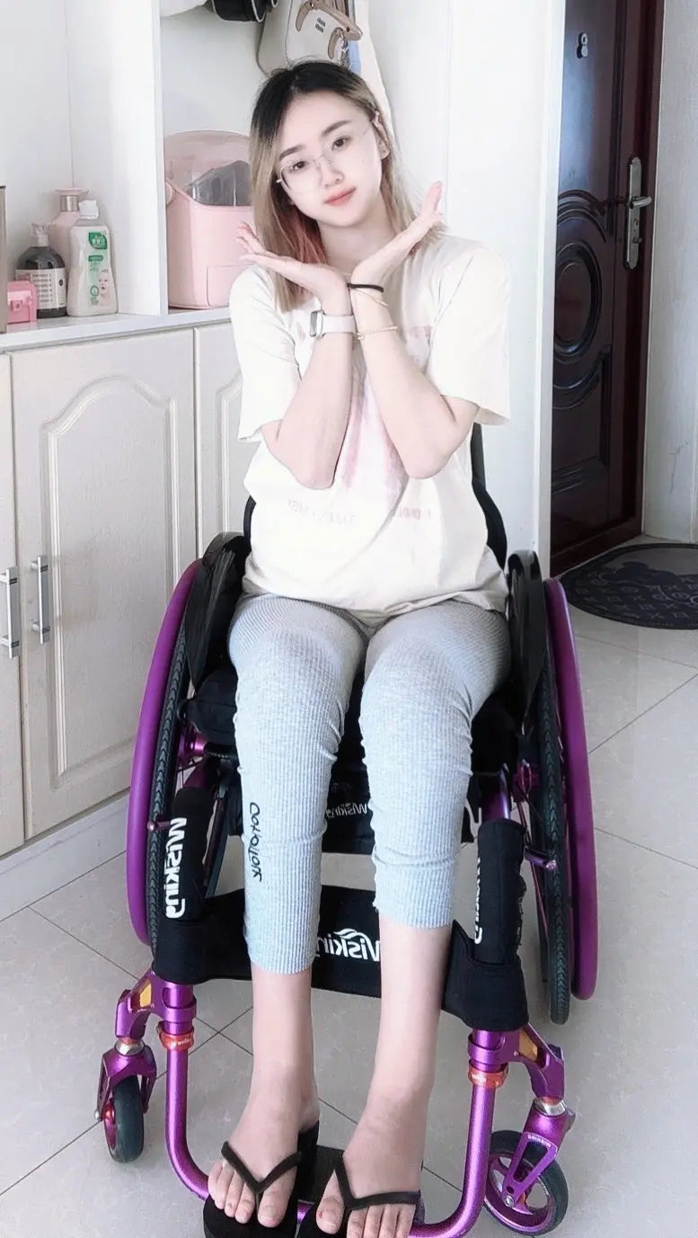 Zoe: Paraplegic Girl's transport device AmputeeClub