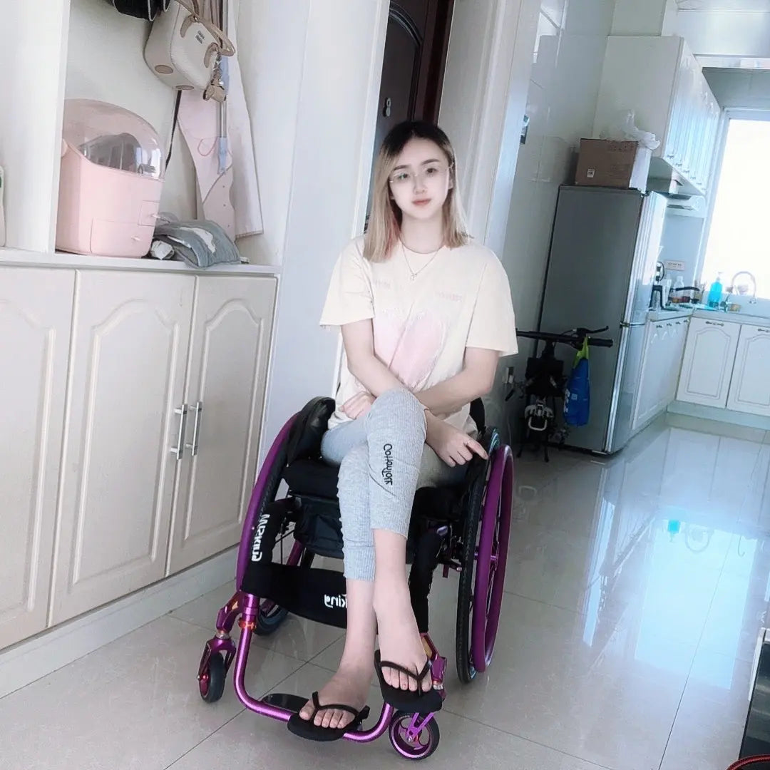 Zoe: Paraplegic Girl's transport device AmputeeClub