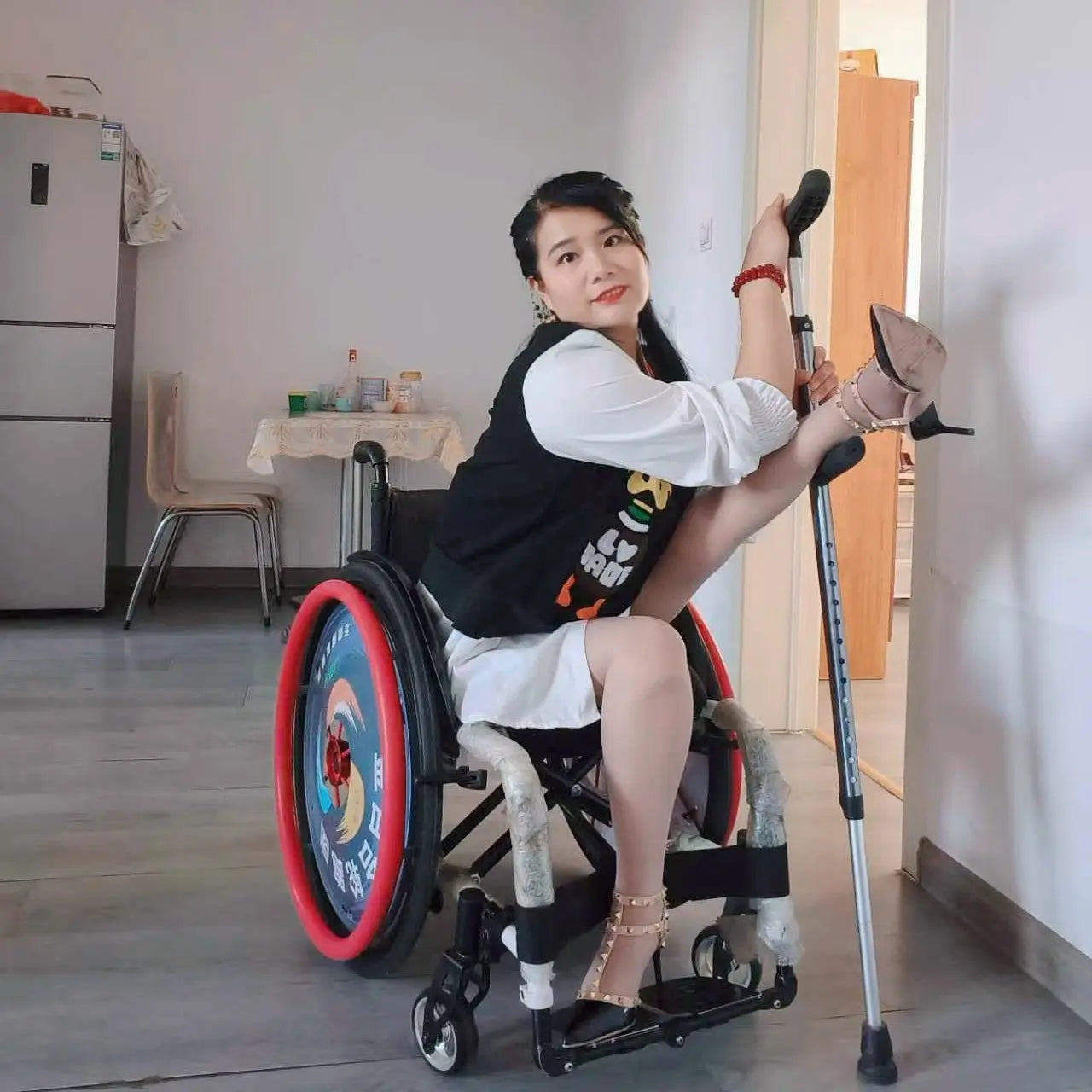 Carrie:Polio Lady-Walking with hands on knees AmputeeClub