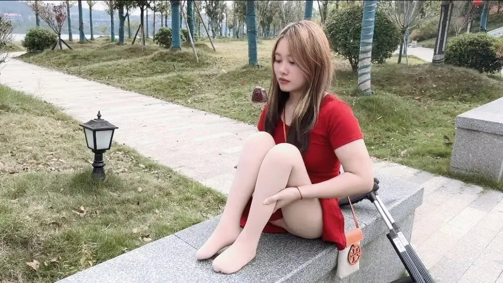 Miki: Polio Girl- Red Skirt AmputeeClub