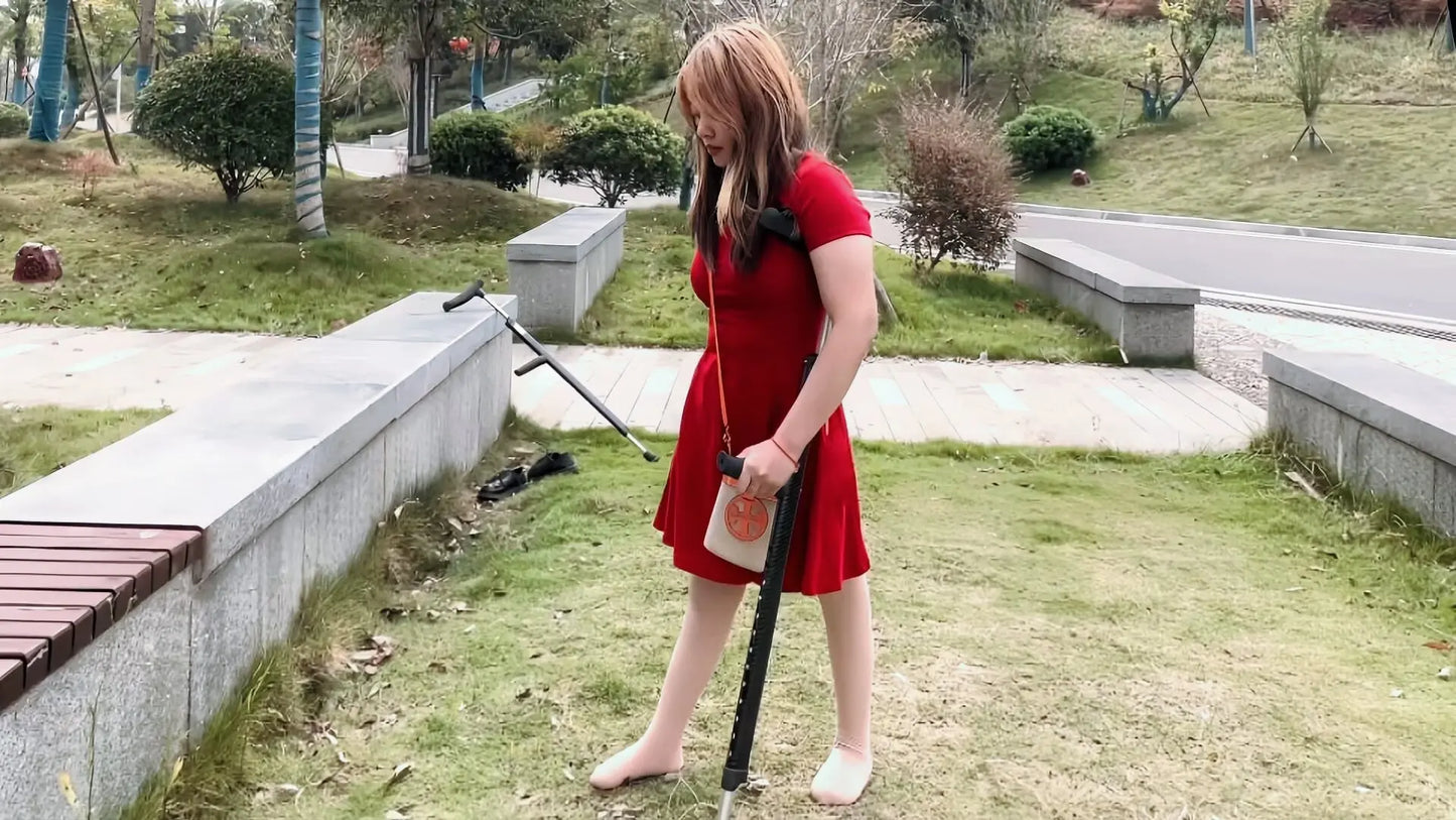 Miki: Polio Girl- Red Skirt AmputeeClub