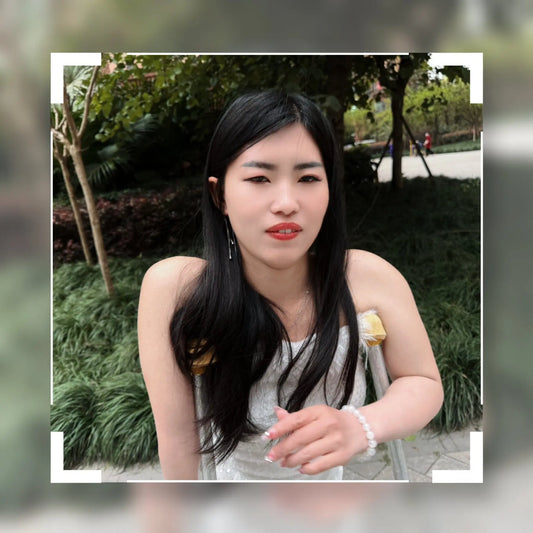 Maria: Polio Girl - Walking with crutches in a white chiffon dress AmputeeClub