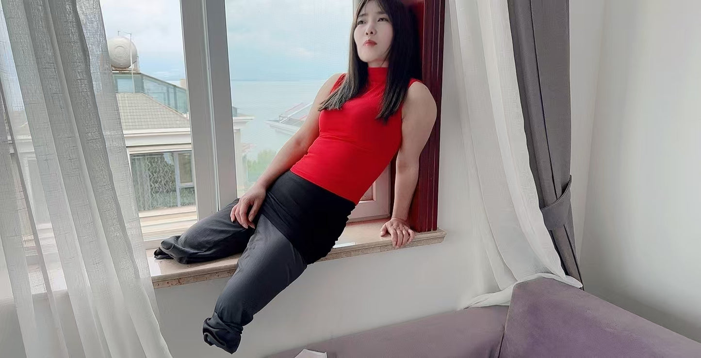 Sally: Dak Amputee Girl - Red clothed girl wearing a pair of prosthetic limbs