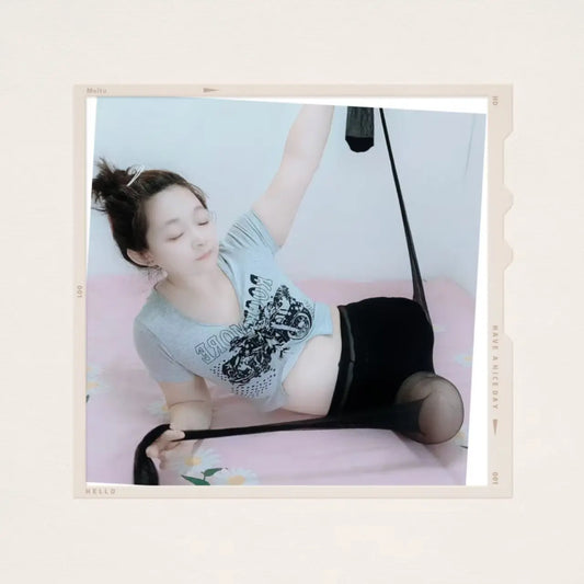 Sugar: Dak Amputee Girl - A legless girl playing with black stockings AmputeeClub