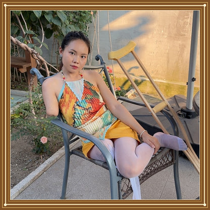 Abby: Ooe, the Amputee Girl - Courtyard Strolls in a Yellow Dress