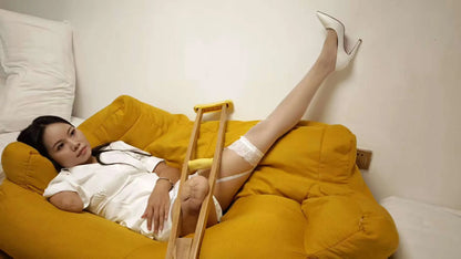 Abby: Ooe Amputee Girl - Wearing a white shirt and white high heels AmputeeClub