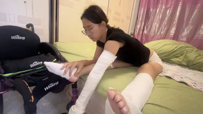 Zoe: Paraplegic Girl with Bandages wrapped around arms and legs