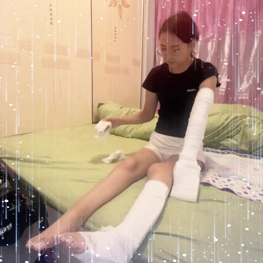 Zoe: Paraplegic Girl with Bandages wrapped around arms and legs