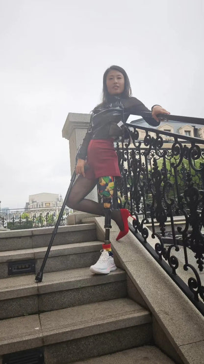 Ayla: Sak Amputee Girl Black stockings and colorful prosthetic limbs for traveling