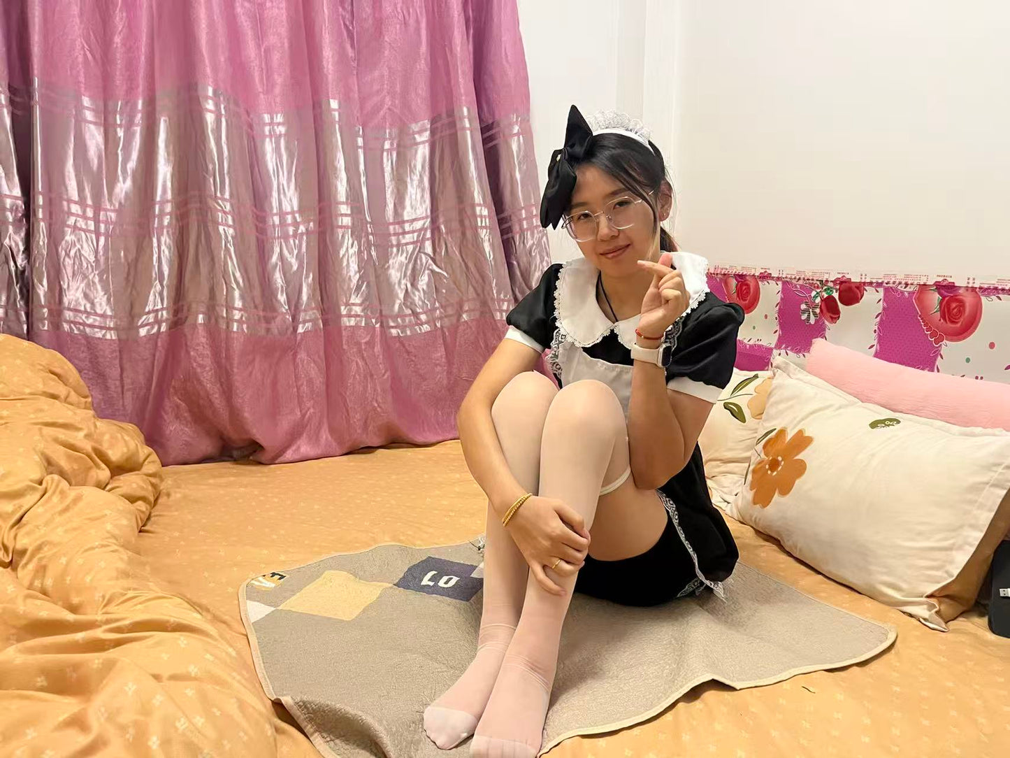 Zoe: Paraplegic Girl, a maid in white stockings, moves on a diaper pad.