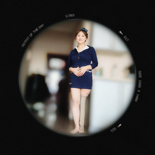 Grace: Sak Cosplaying in an airline stewardess uniform