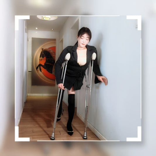 Rose the Polio Girl showcases over-the-knee socks on her legs of different thicknesses.