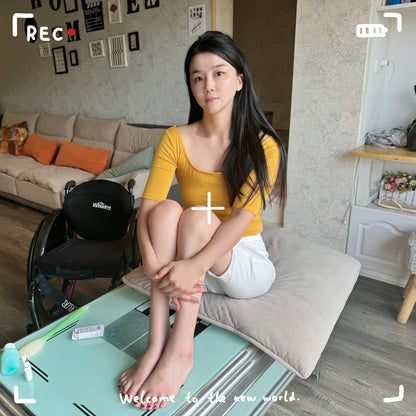 Belle: A paraplegic girl - washing her feet and applying nail polish