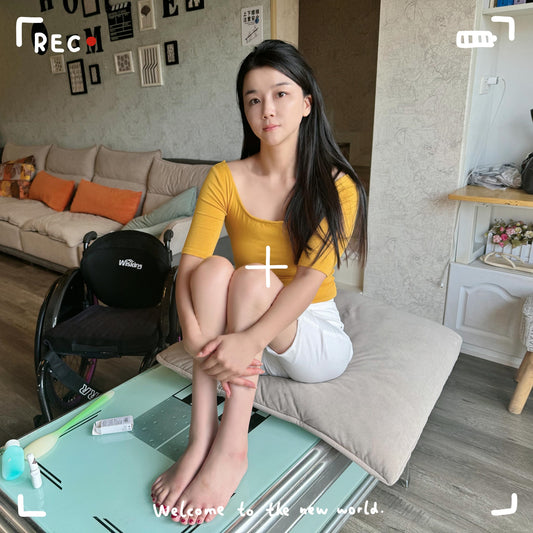 Belle: A paraplegic girl - washing her feet and applying nail polish