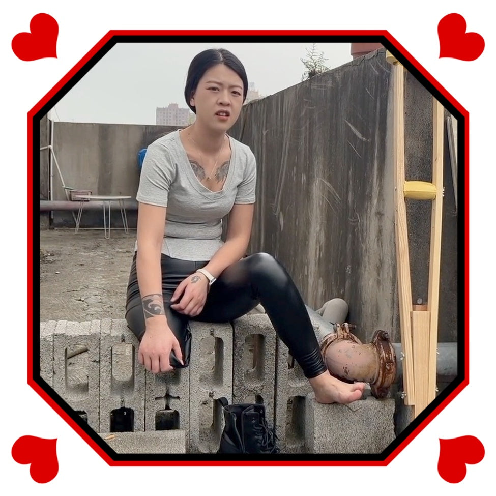 Amy: Sak Amputee Girl - Climbing stairs in leather pants and boots with crutches