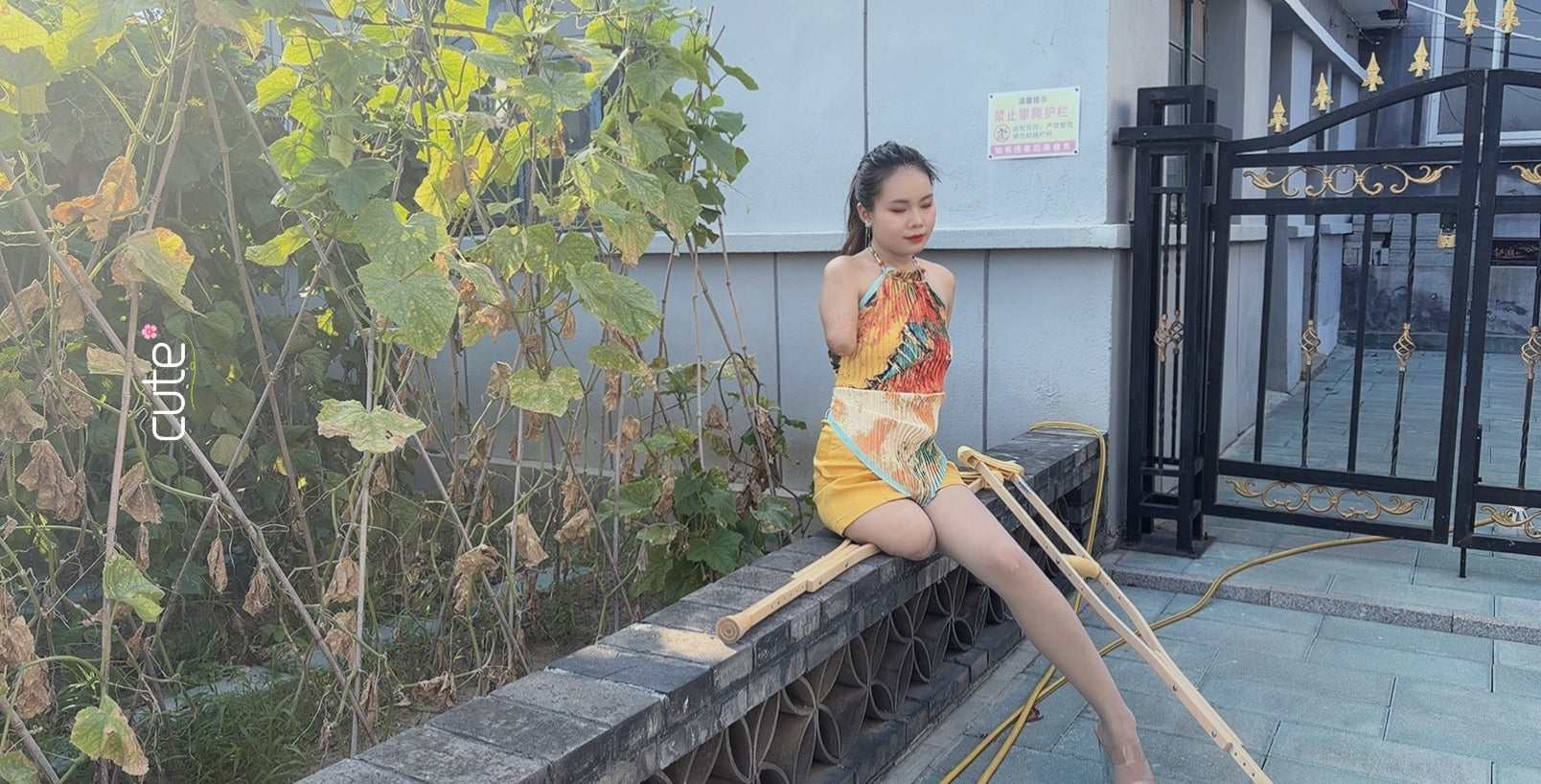 Abby: Ooe, the Amputee Girl - Courtyard Strolls in a Yellow Dress