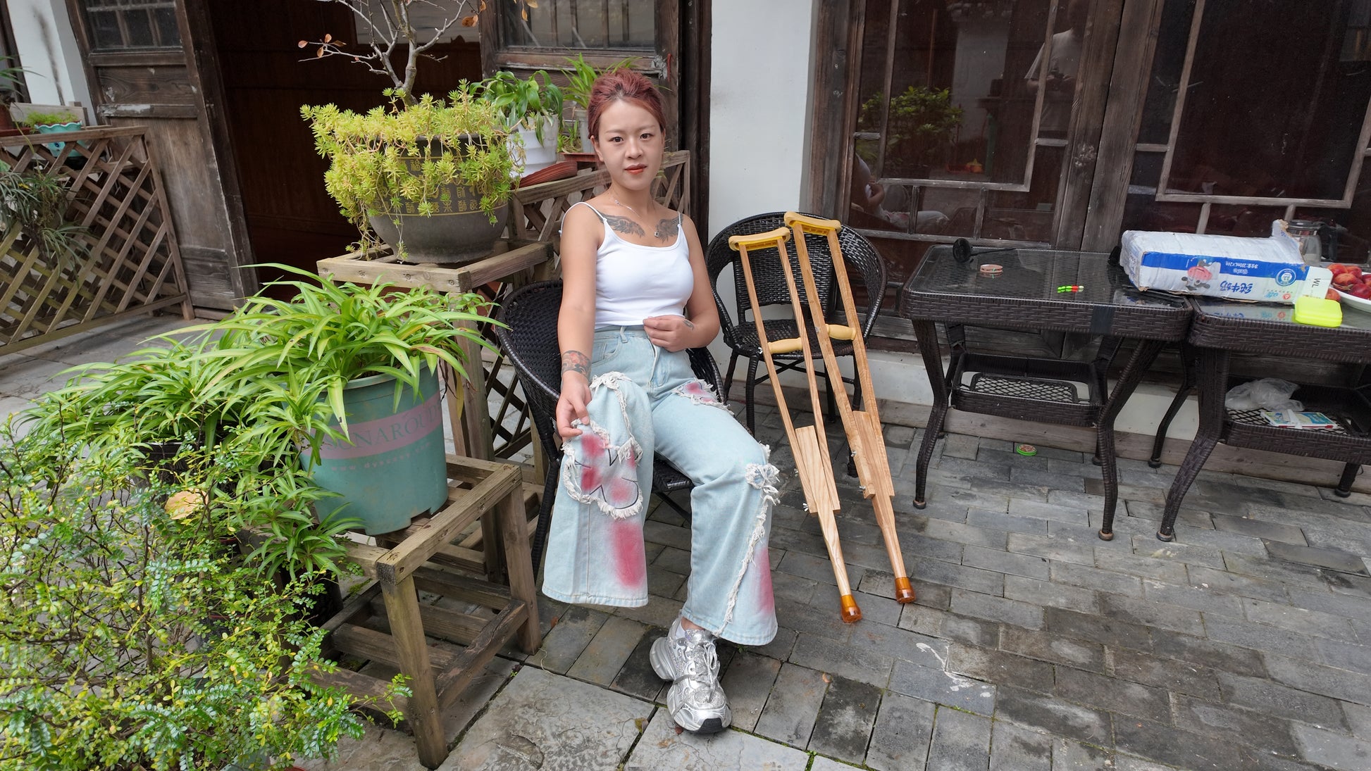 Amy: Sak, the amputee girl, went out to explore for the first time using crutches.