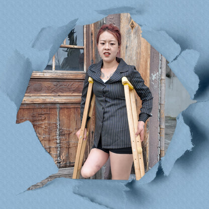 Amy: Sak Amputee girl, touring the ancient town on crutches.