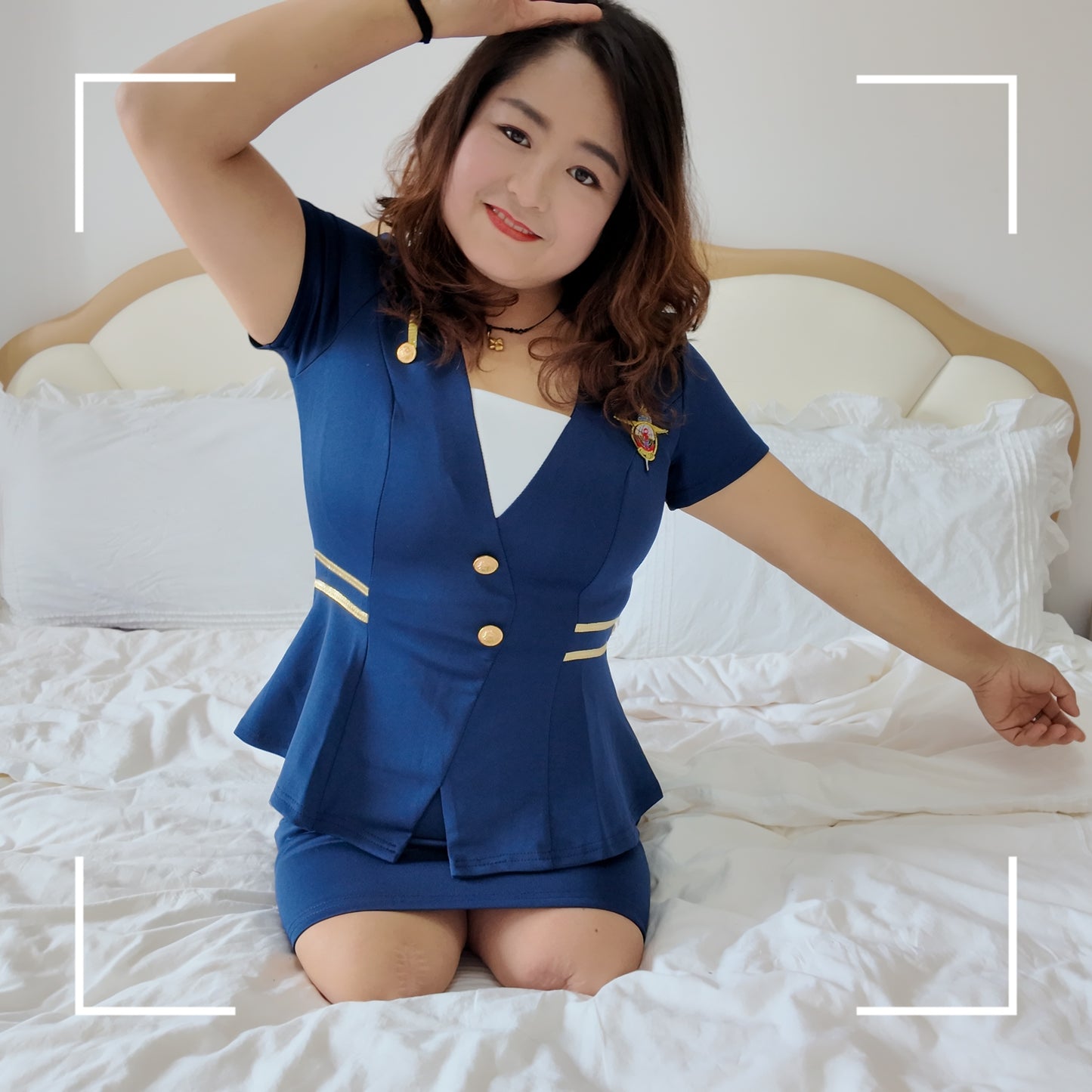Tina, an amputee girl, is changing her stockings while wearing a blue uniform in bed.