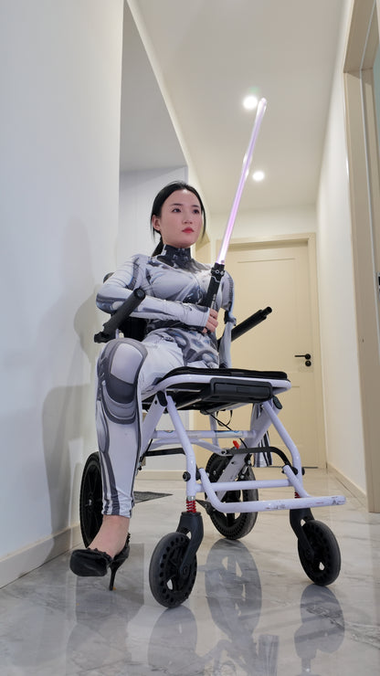 Beibei: OOE Amputee Girl cosplaying as a mechanical girl in an electric wheelchair.