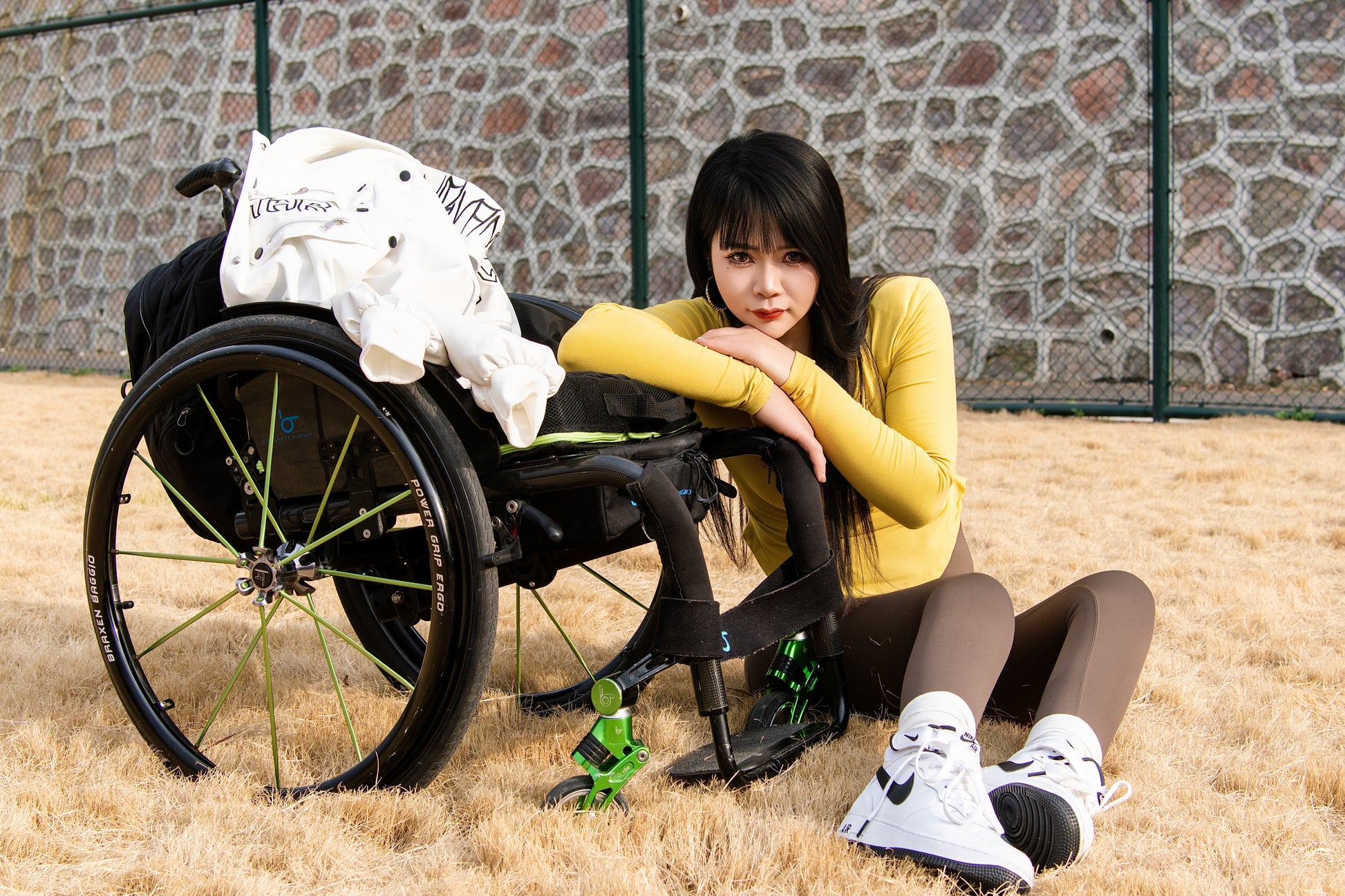 The Para Girl Nora Playing basketball in a wheelchair