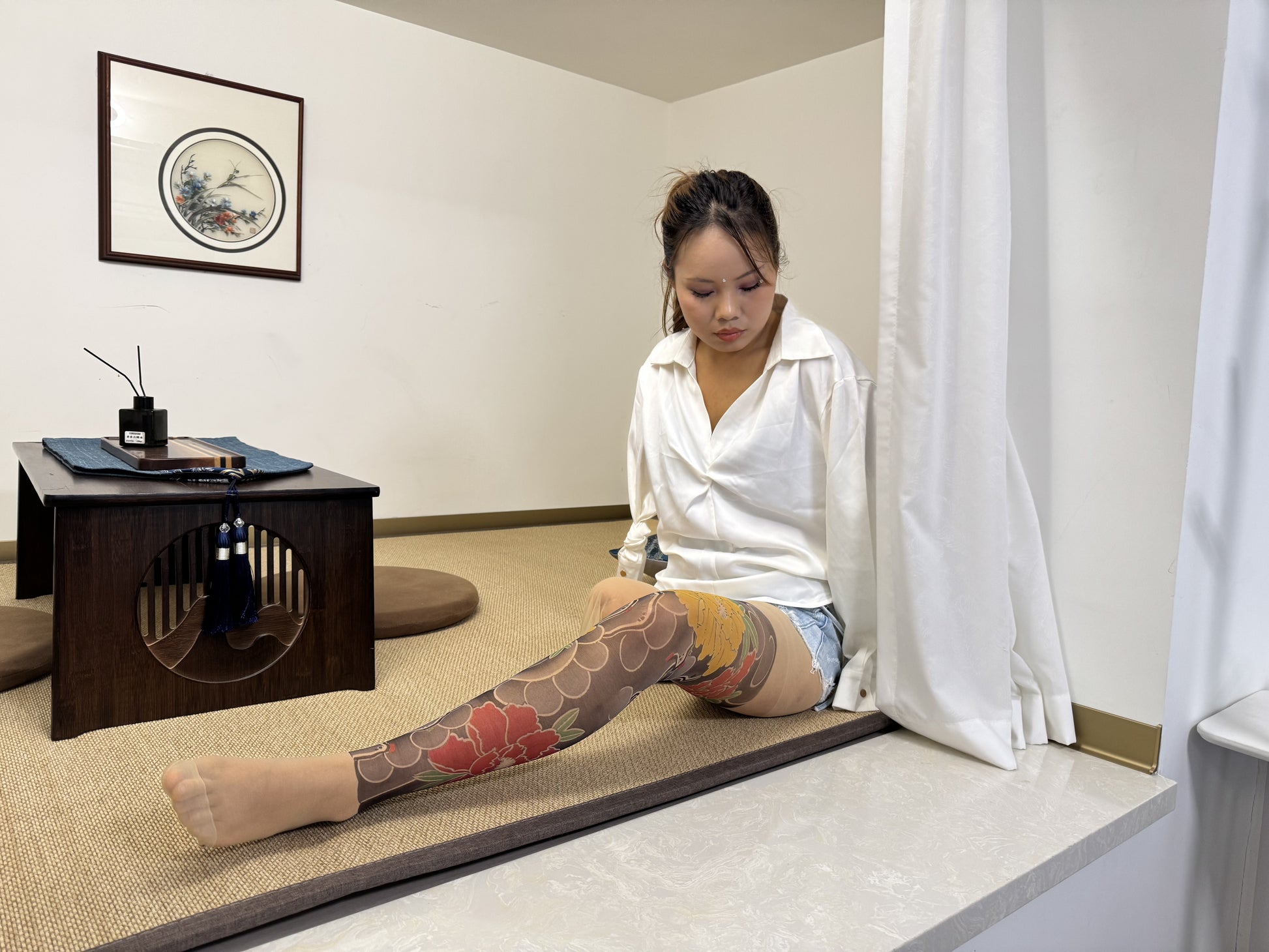 Abby: Ooe Amputee Girl showcasing youthful energy white shirt and denim shorts.