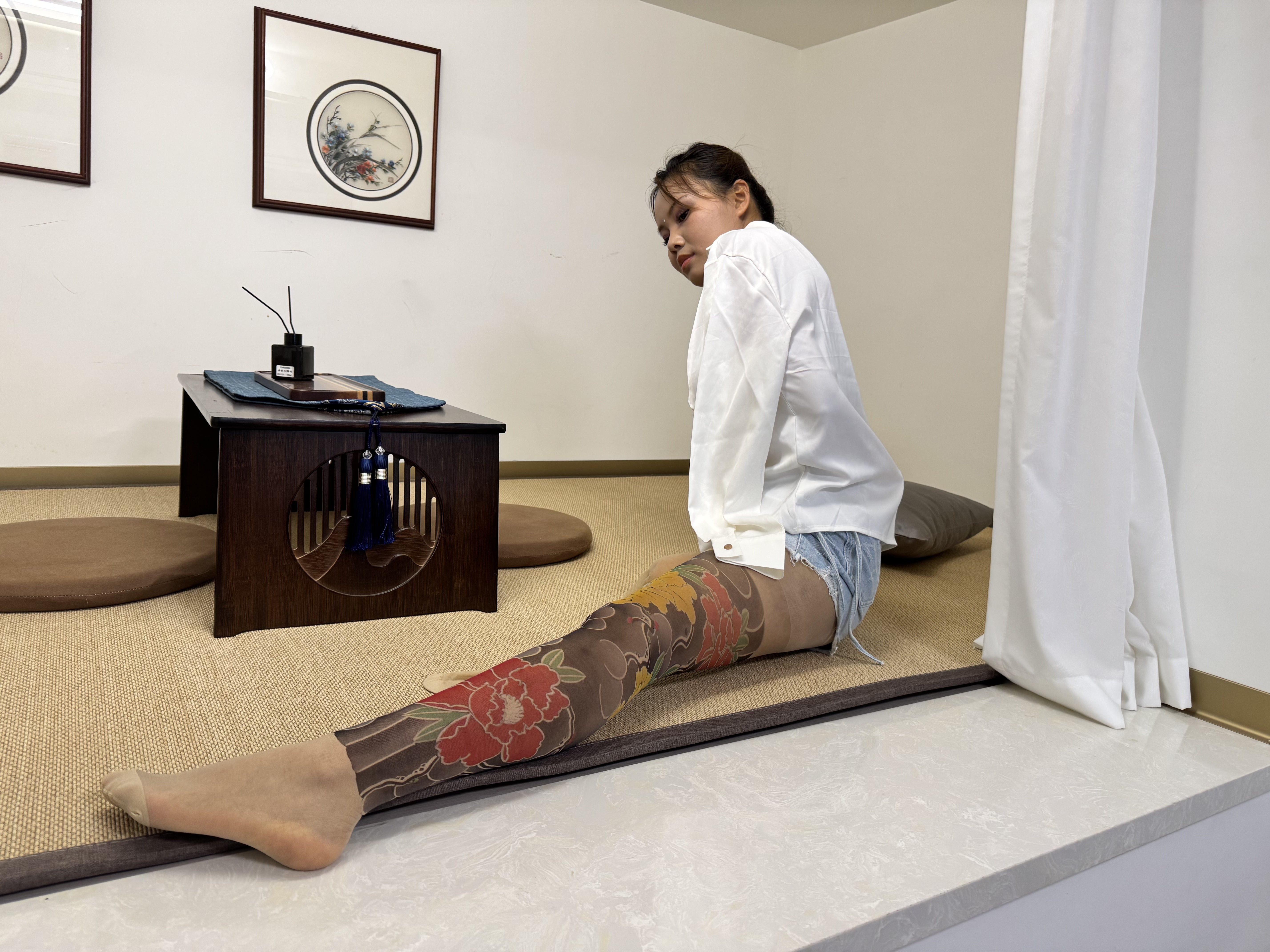 Abby: Ooe Amputee Girl showcasing youthful energy white shirt and denim shorts.