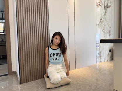 Ayla: Sak Amputee Girl disguised as DBK, gliding on a mat in stockings.