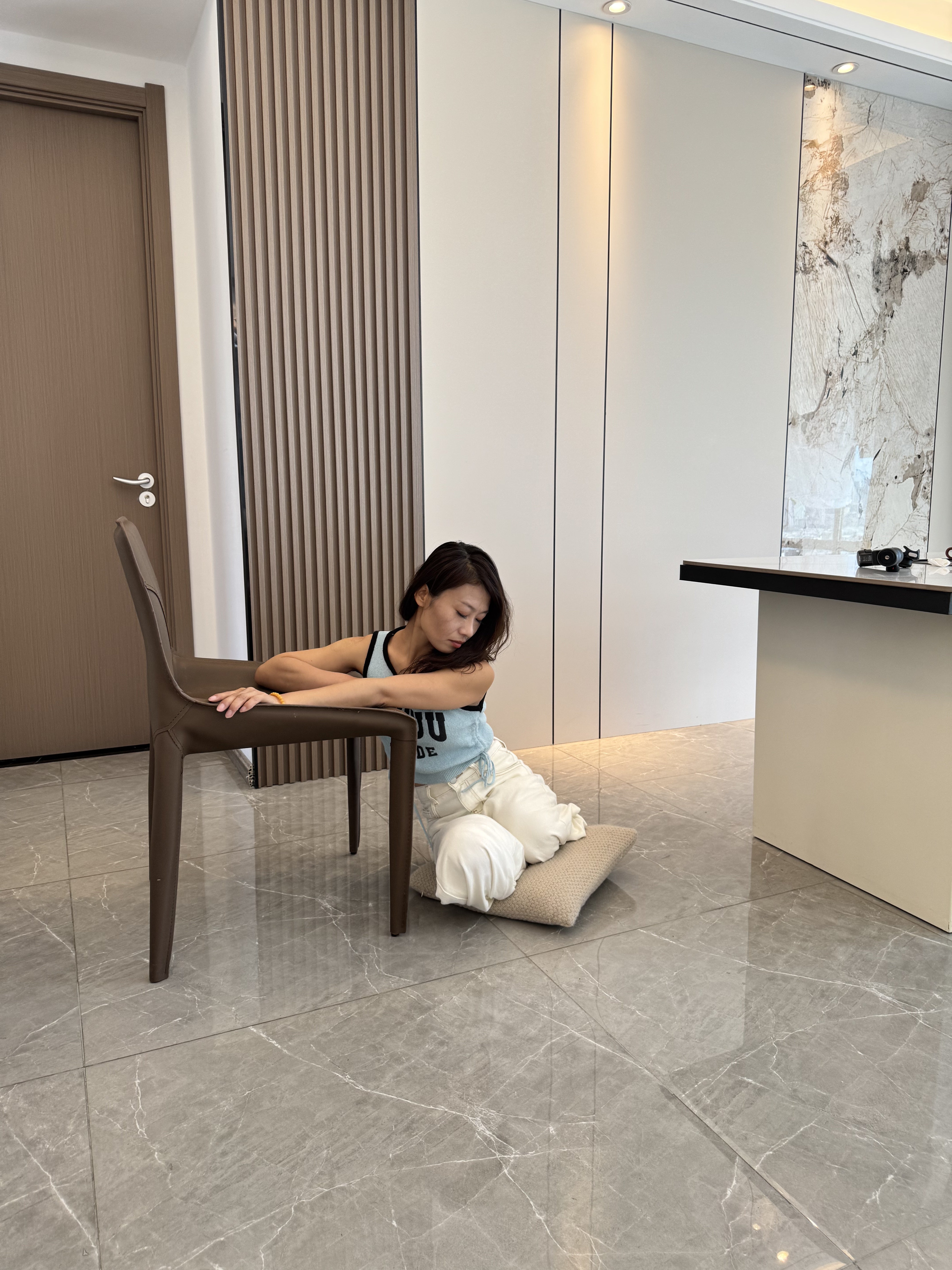 Ayla: Sak Amputee Girl disguised as DBK, gliding on a mat in stockings.