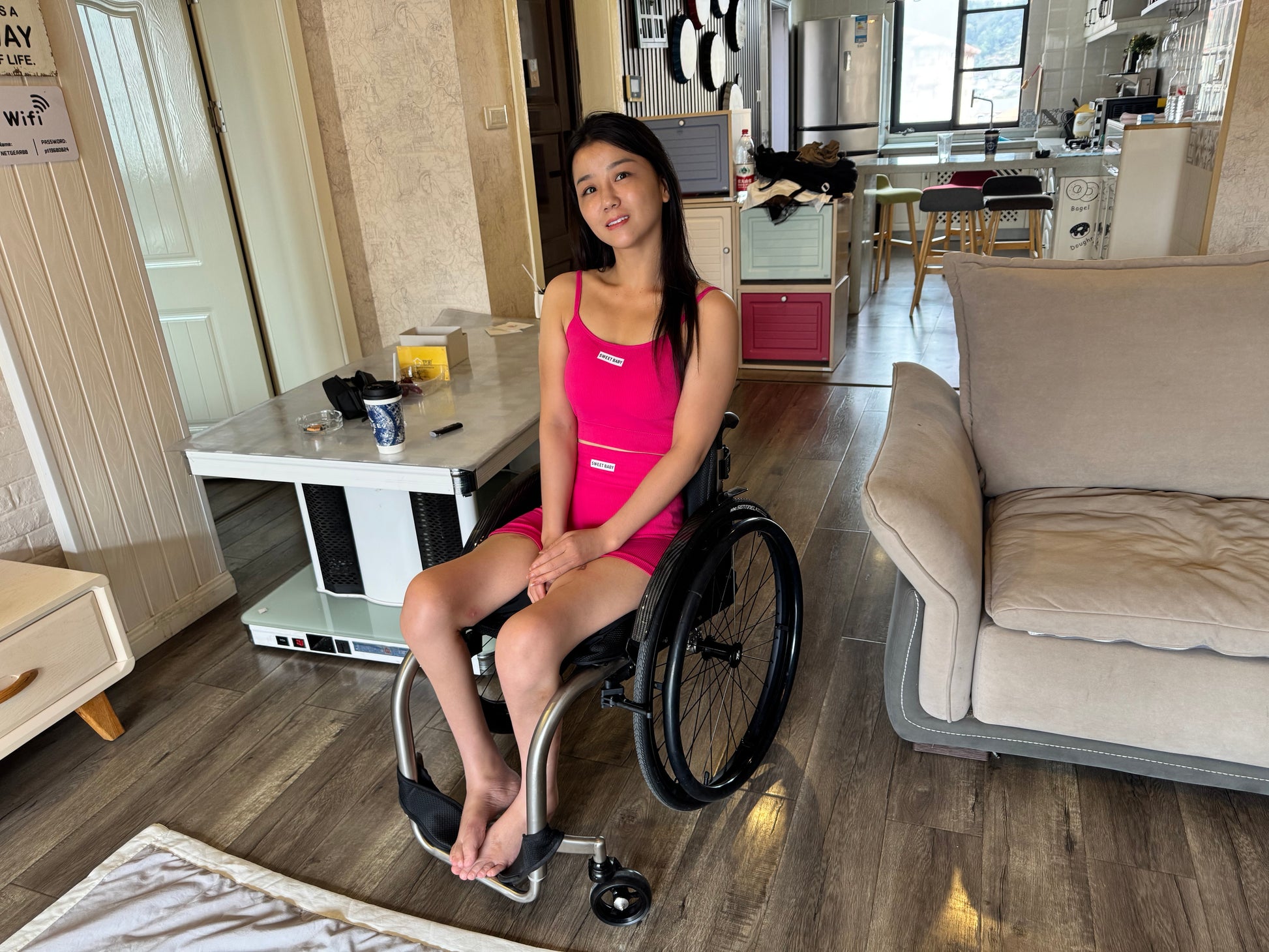 Belle: A paraplegic girl who maintains physical vitality through yoga.