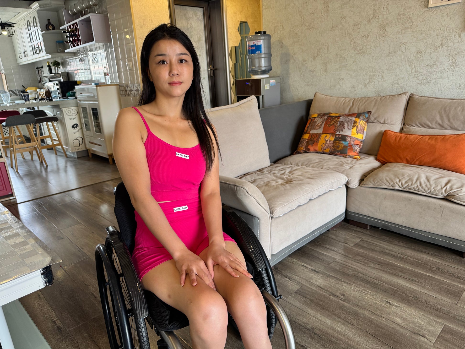 Belle: A paraplegic girl who maintains physical vitality through yoga.