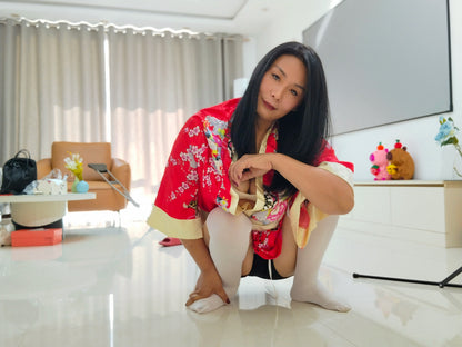 Liona, the polio girl, was washing her hair with a cane, wearing a bathrobe and white stockings.