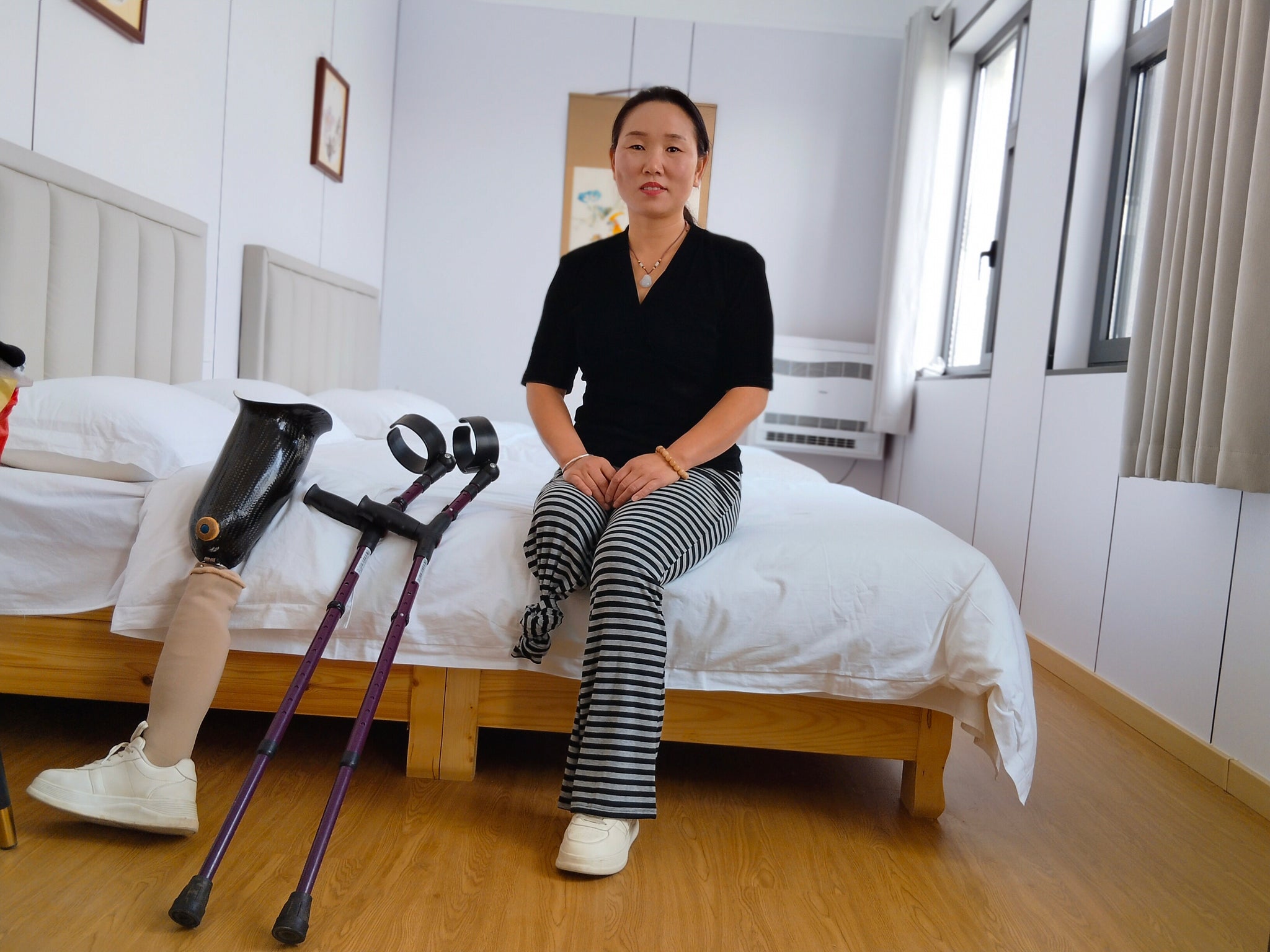 Gigi: Sak Amputee Girl - Using elbow crutches to go out for a walk in spring.