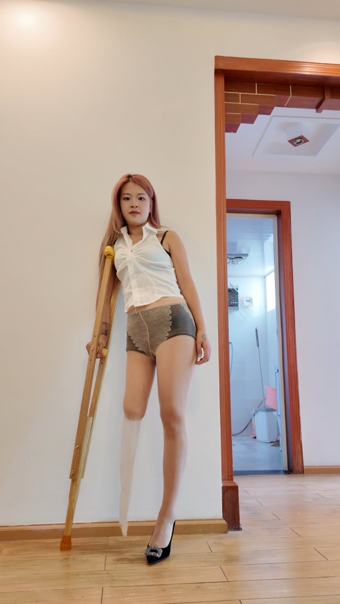 Amy: Sak Amputee girl wearing black and gray stockings