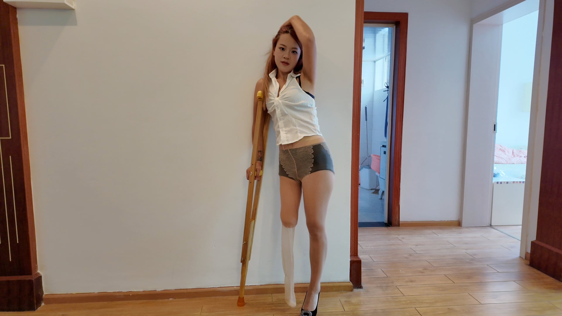 Amy: Sak Amputee girl wearing black and gray stockings