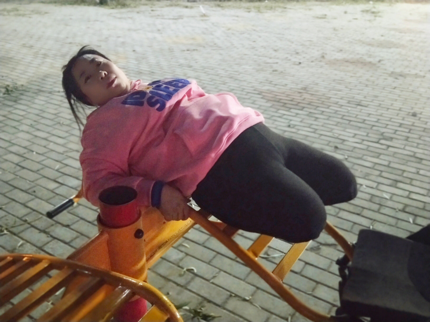 Beryl: Dak Amputee Girl - Using a wheelchair to try out fitness equipment