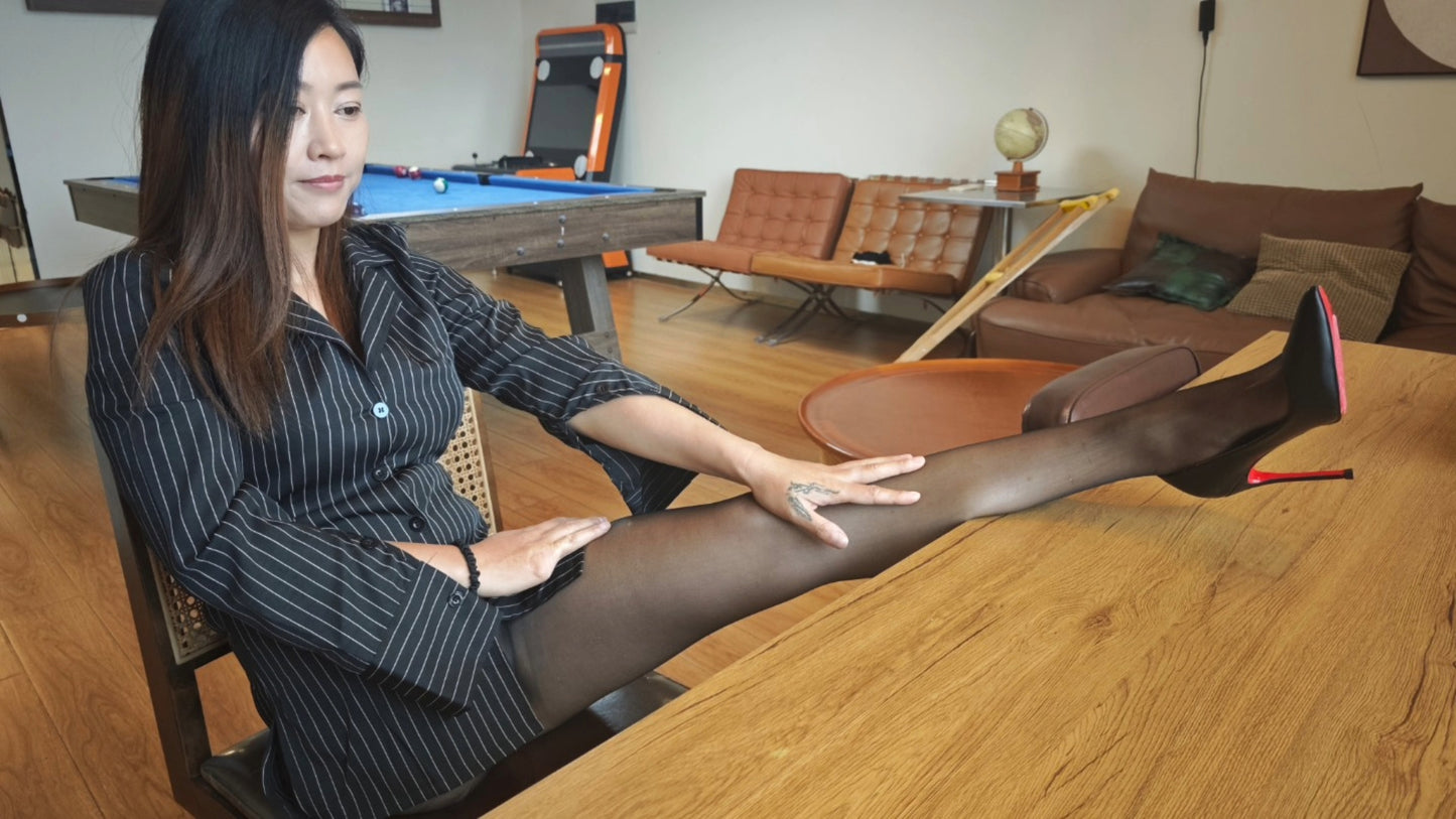 Emma: Shd Amputee Girl displays her beautiful legs in black stockings and her prosthetic limb on a billiard table.
