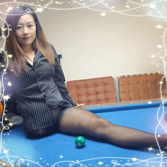 Emma: Shd Amputee Girl displays her beautiful legs in black stockings and her prosthetic limb on a billiard table.