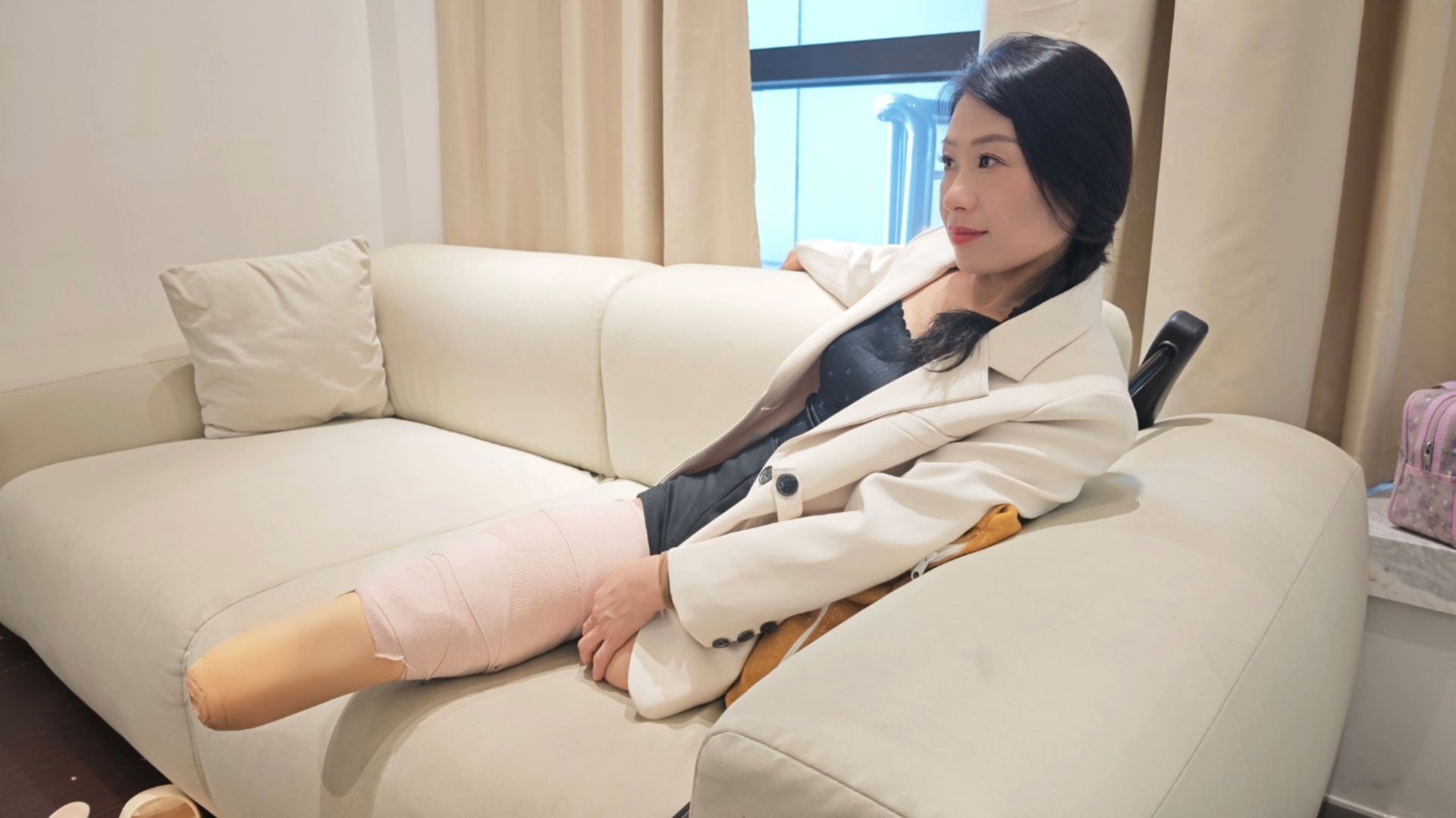 Ayla: Sak, the amputee girl, is wearing a black tank top and pretending to be Dak.