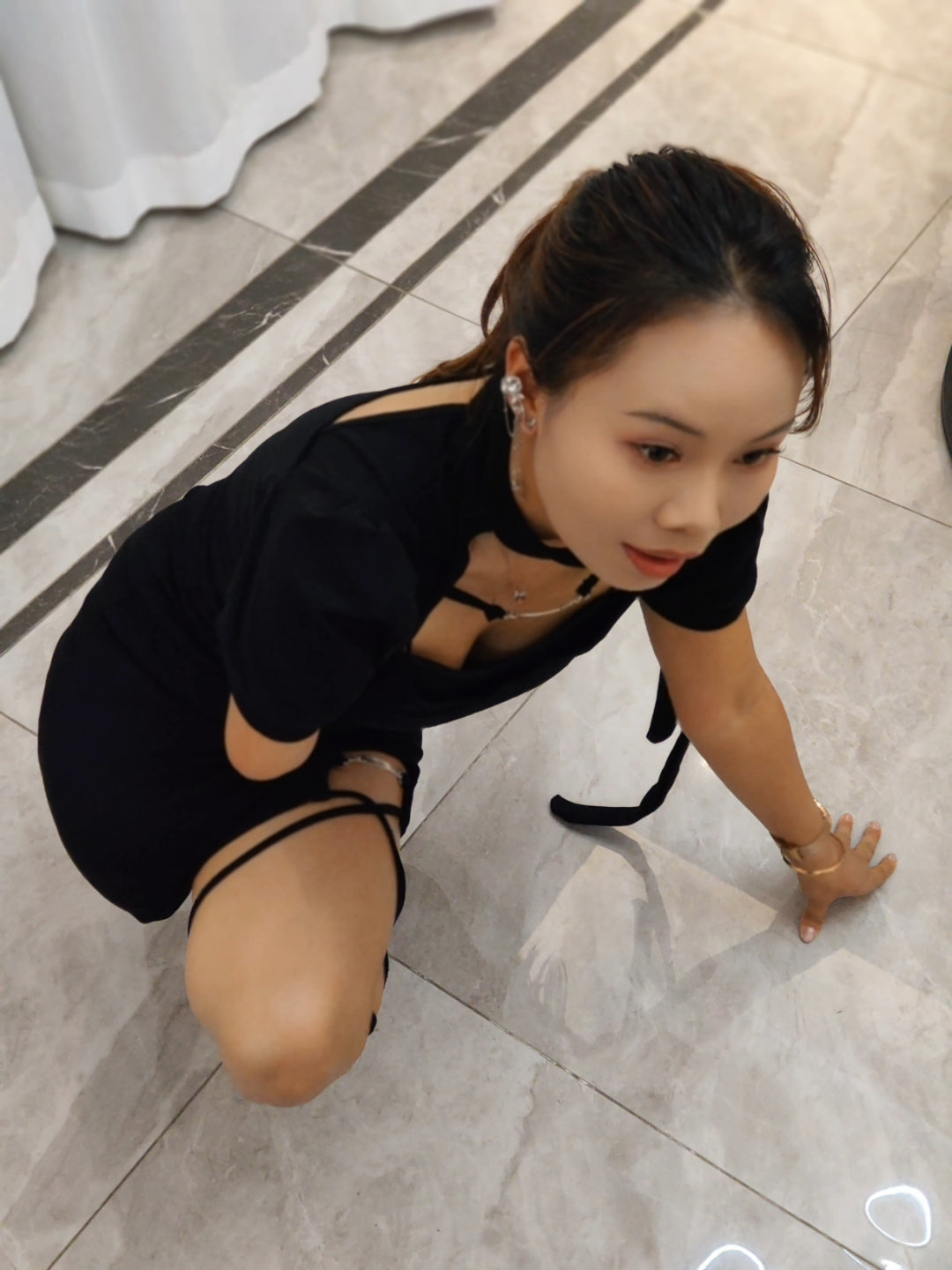 Abby: Ooe Amputee Girl - Applying nail polish to her amputated limb wound