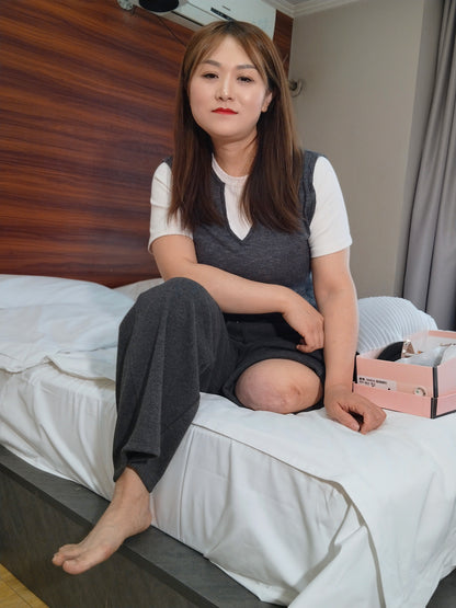 Grace, A Sak Girl - An amputee girl in business attire and high heels